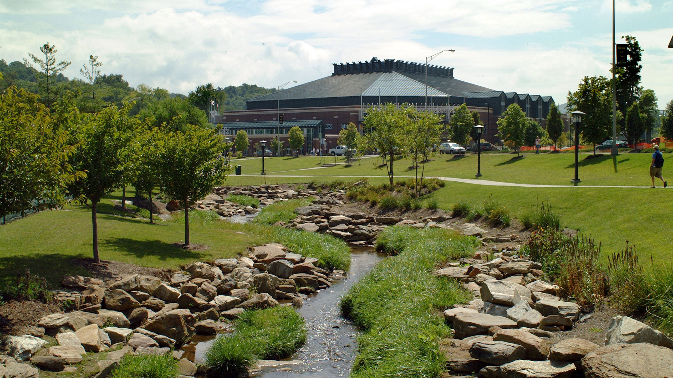 holmes convocation center exterior with stream